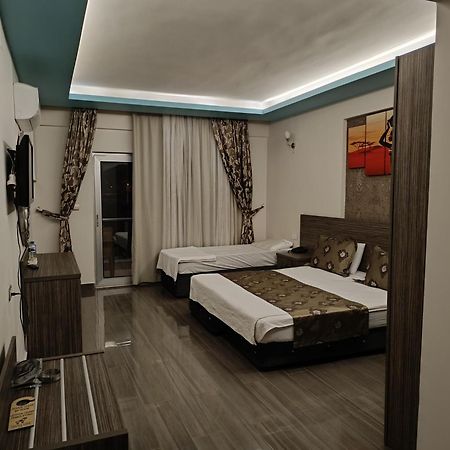 Truva Life Hotel Samandag Bagian luar foto