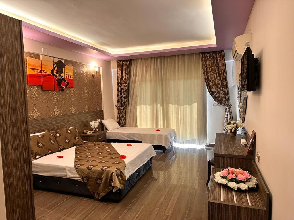 Truva Life Hotel Samandag Bagian luar foto